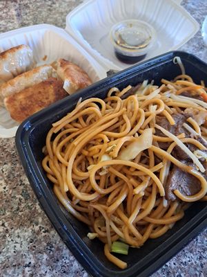 Dumplings and chow mein take out. at Chef Kenny's Vegan Dim Sum in Las Vegas