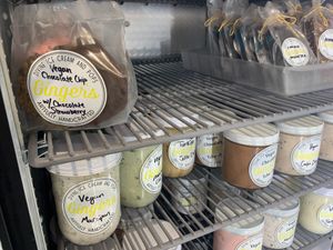 Vegan ice cream sandwiches and pints in glass jars at Ginger's Divine Ice Creams in Los Angeles