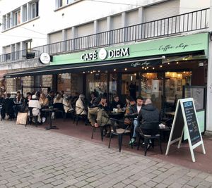 Front of the coffee shop and outdoor seating area at Café Diem in Lorient