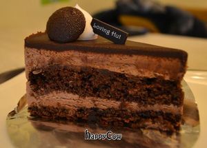 The cake was pretty dry, but the ganache, mousse, whipped cream, and LH topper were all pretty good. at Loving Hut Gangnam-gu - 러빙헛 in Seoul