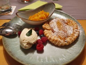 Birnen-Blätterteigtarte mit Mandelmousse und Kürbiskompott at Gasthaus Bürgerstüble in Sankt Peter
