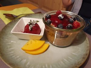 Dunkles Schokoladen-Tiramisu mit Zwetschgenröster und Cassissorbet at Gasthaus Bürgerstüble in Sankt Peter