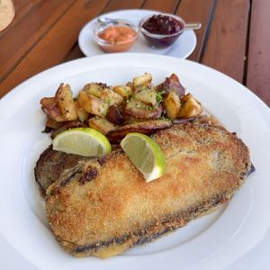eggplant cordon bleu with fried potatoes and dips  at Gasthaus Bürgerstüble in Sankt Peter