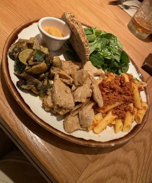 Market food with no chicken, mushroom curry, and vegan pasta bolognese.   at Margarito in Valencia