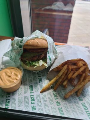 Double beefburger with fries and homemade chipotle mayo at Vegan Shack - Piccadilly Gardens in Manchester