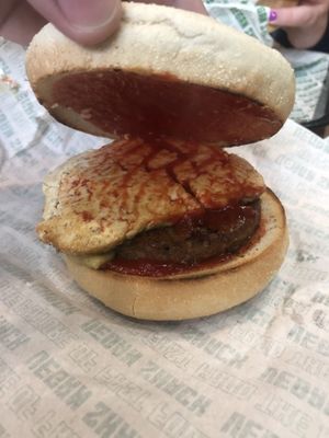 Inside of the muffin - sausage, tofu, ketchup  at Vegan Shack - Piccadilly Gardens in Manchester