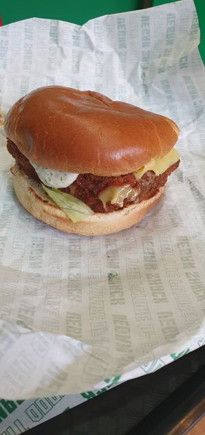 Fillet Faux Fish: Toasted Bun, Faux Fish Fillet, half a slice of cheeze & an in-house made Tartar sauce at Vegan Shack - Piccadilly Gardens in Manchester