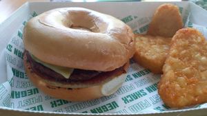 Breakfast bagel with sausage patty at Vegan Shack - Piccadilly Gardens in Manchester