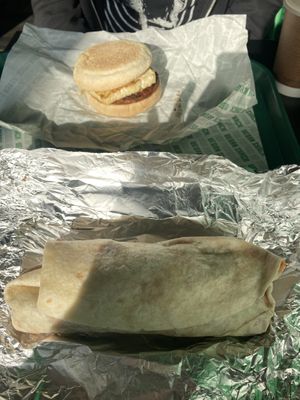 Breakfast wrap (foreground) breakfast muffin (background)  at Vegan Shack - Piccadilly Gardens in Manchester