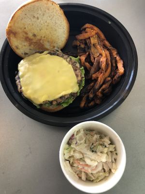 Black Bean Burger with Sweet Potato Fries & Cole Slaw  at The Juice Jar in Erie
