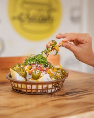 nachos, chillibeans, queso vegan, guacamole, pico de gallo, chile, lechuga, ranch at Crush in Merida