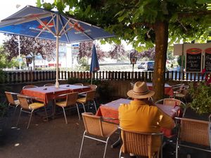 Outdoor seating at Restaurant zur Au in Adliswil