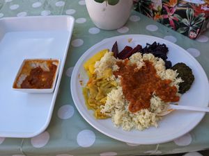 Rice, spicy lentil sauce, and a lot of tasty veggies. at Sara's Äthiopische Küche in Stuttgart