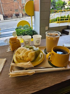 Spinach cheese bread, sweet pumpkin bread, coffee, and earl grey milk tea at Vegan Veganing in Seoul