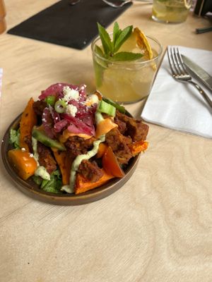 Tempeh salad and elderflower cocktail (both very yummy) at Vegan Food Tour Utrecht in Utrecht
