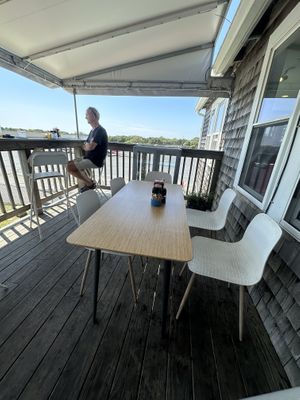 One table on the deck  at Hangar B Eatery in Chatham