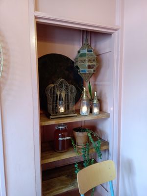 By one of the tables inside at First Eet in Arnhem