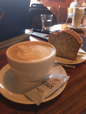 Cafe latte & homemade lemon poppyseed cake at First Eet in Arnhem