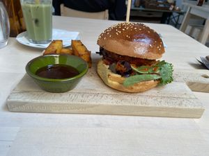 Korean burger with polenta sticks: tasty with a thick patty, but more spicy than I thought. Not only the kimchi but also the sticks and the sauces are spicy.  at First Eet in Arnhem