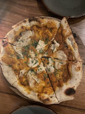Spicy coconut pizza  at Pizza Papi in Tulum