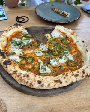 Spicy coconut 🥥   at Pizza Papi in Tulum