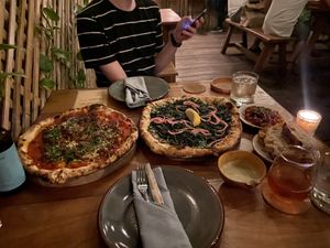 Italian sausage, pesto pizza, caponata starter and ranch for dipping!  at Pizza Papi in Tulum