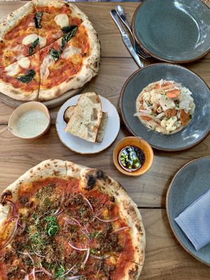 Margarita pizza, beyond meat pizza and the pickled veggie appetizer  at Pizza Papi in Tulum