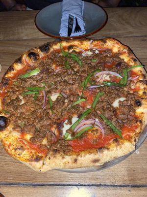 supreme pizza  at Pizza Papi in Tulum