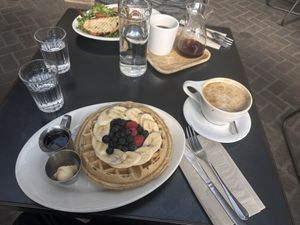 Belgian waffle with fruit and latte  at Freesoulcaffe in Tustin