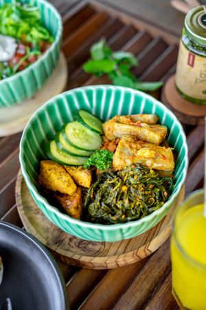 Jackfruit Rendang with Tempe Curry & Gulai Cassava Leaf Rice Bowl at Sayavegan in Kuta