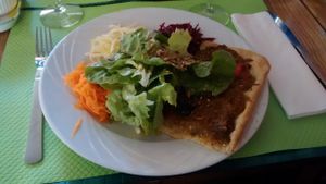 Pissaladière (onion pie) and salad at Le Tournesol Cuisine Vegetarienne in Albi