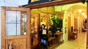 The paper bag for the grocery shop bit has a cool stamped image of a cats face on it.  at Modernark in Kobe