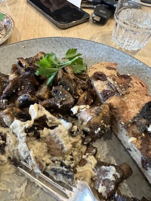 Za’atar and hummus mushrooms with olive bread   at Mr Burch in Mckinnon