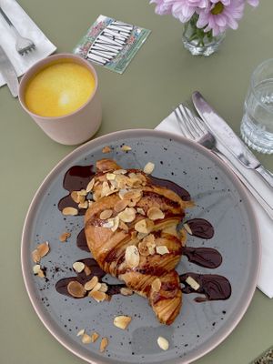 Croissant and golden latte at Linnaean in South West London