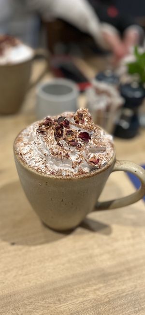 Hot chocolate with cherry syrup and cream  at Figaro in Wingerworth