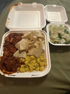 BBQ tofu, vegan Mac, tortilla chips, & salad. Normally comes with cinnamon apple desert but I’m allergic to cinnamon so none for me. (Wednesday menu)  at Krishna Lunch in Gainesville