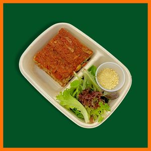 Lasagna as you've never had before.  Layers of white beans and almond rose sauce underneath, tofu herb ricotta in the middle, and marinara with artichoke hearts on top. Gluten free at P2F Meals in Fort Myers