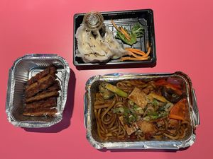 My takeout: fried spicy udon, crystal dumplings, soy steak  at EatHappy Vegan in Oslo