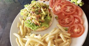 Open veggie burger at Naya Athithi Pure in Kovalam