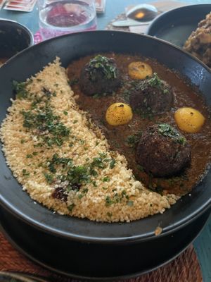 Burnt and tomato paste. Date couscous was good though  at El Armadillo Mazunte in Mazunte