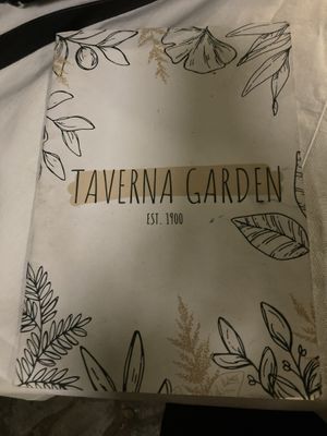 Menu and mousakka   at Taverna Garden  in Crete