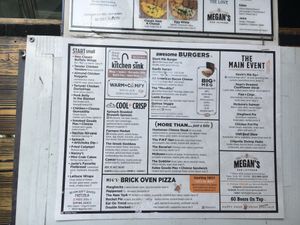 Placard menu--notice, nothing listed as vegan...even the salads are not vegan. I don't see the vegetable wrap or mushroom ciabatta sandwich mentioned by other reviewer (maybe discontinued?)
 at Megans Bar and Kitchen  in New York City