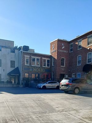 Turn right onto tiny Grant St off Queen to find Norbu, at the back of Queen at Norbu in Lancaster