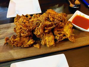 Onion rings, really onion pakoras, huge crispy heaven! at Norbu in Lancaster