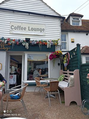 Front of cafe with outdoor seating and cyclists allowed. Dogs also. at Coffee Lounge in Dymchurch