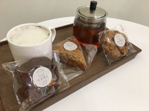 Black Sesame Latte and Tea with a pumpkin scone and cookies  at Ve Bread - 비 브레드 in Ulsan