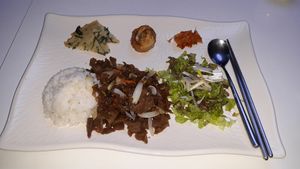 Grilled bulgogi and side dishes at Loving Hut - Rodeo in Daegu