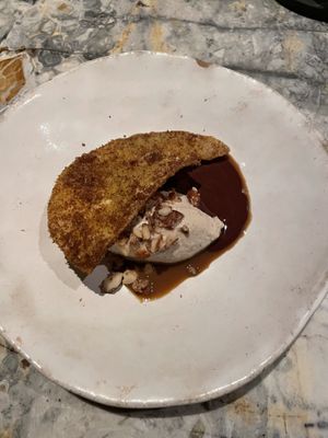 Desert! Ice cream with chocolate sauce and chips roasted with sugar and cinnamon.   #Veganuary at Hoy in Paris