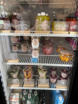 Fridge with delights: We had the freshly chopped mango (some of the best we've had), and the outstanding pea shoots guac! at Root 2 Rise in Pleasantville