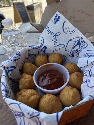Potato puffs with ketchup    at Grégoire in Berkeley